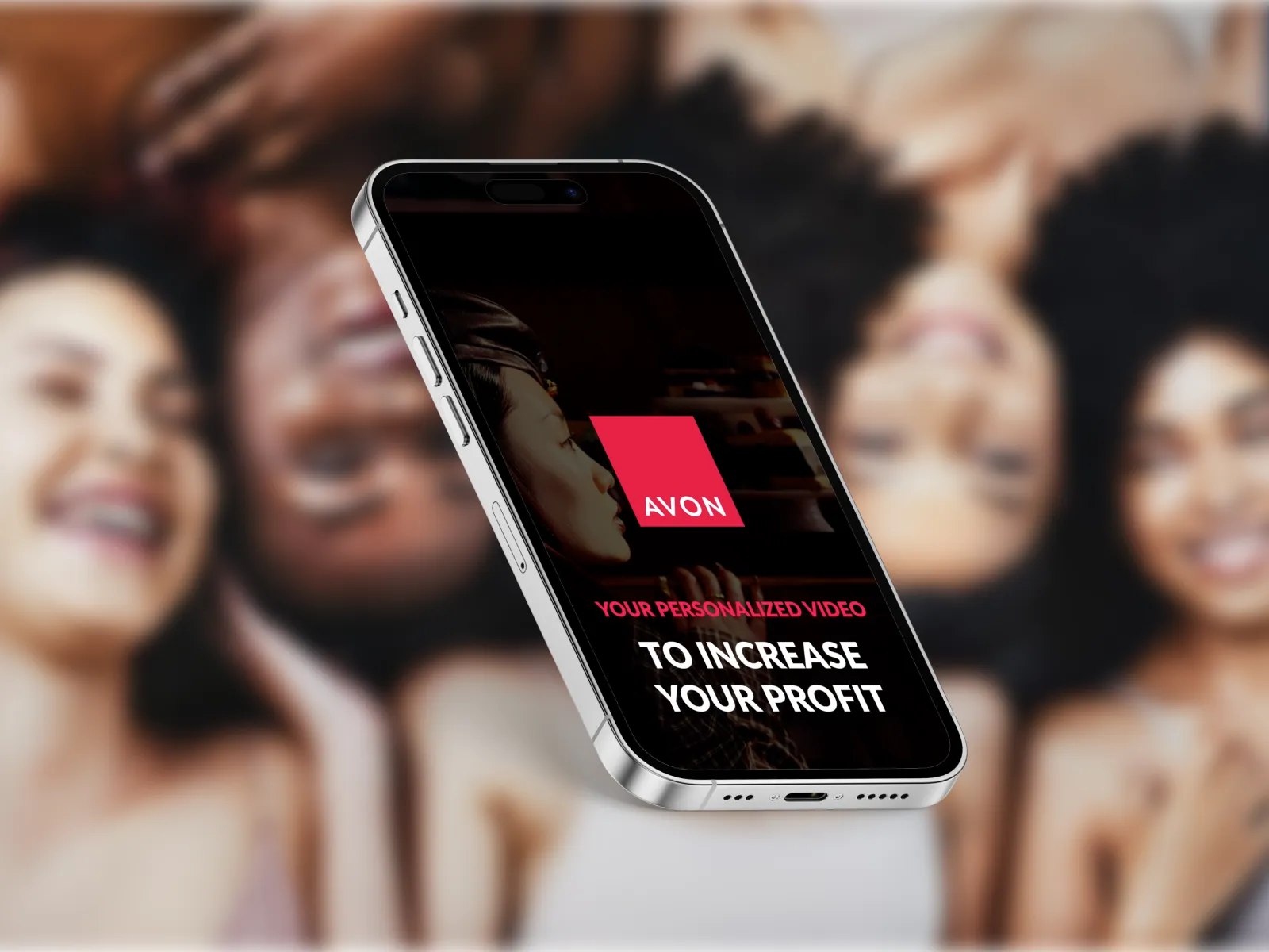 An Avon representative smiling while using a mobile phone