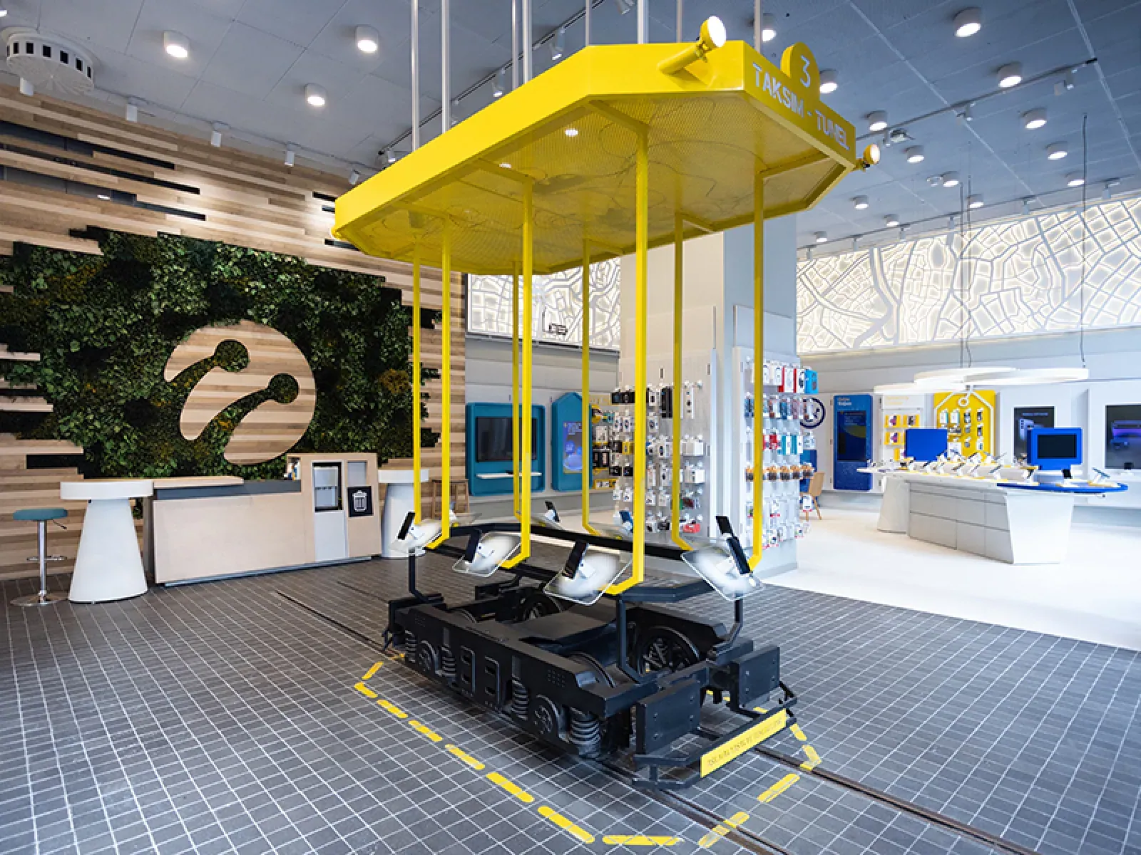 A next-generation Turkcell concept store with a sculptural display and OmmaSign screens throughout